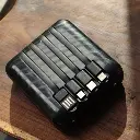 batterie-de-secours-ultra-compacte-10-000-mah-noire-avec-4-cables (3).webp